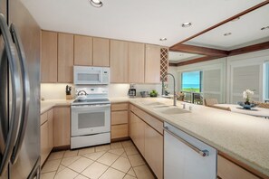 Condo, 2 Bedrooms, Oceanfront (Unit 514, 2 Bath) | Private kitchen | Fridge, microwave, oven, stovetop - Poipu Sands by OUTRIGGER (Koloa)