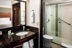 Combined shower/tub, designer toiletries, hair dryer, towels