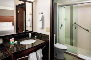 Combined shower/tub, designer toiletries, hair dryer, towels