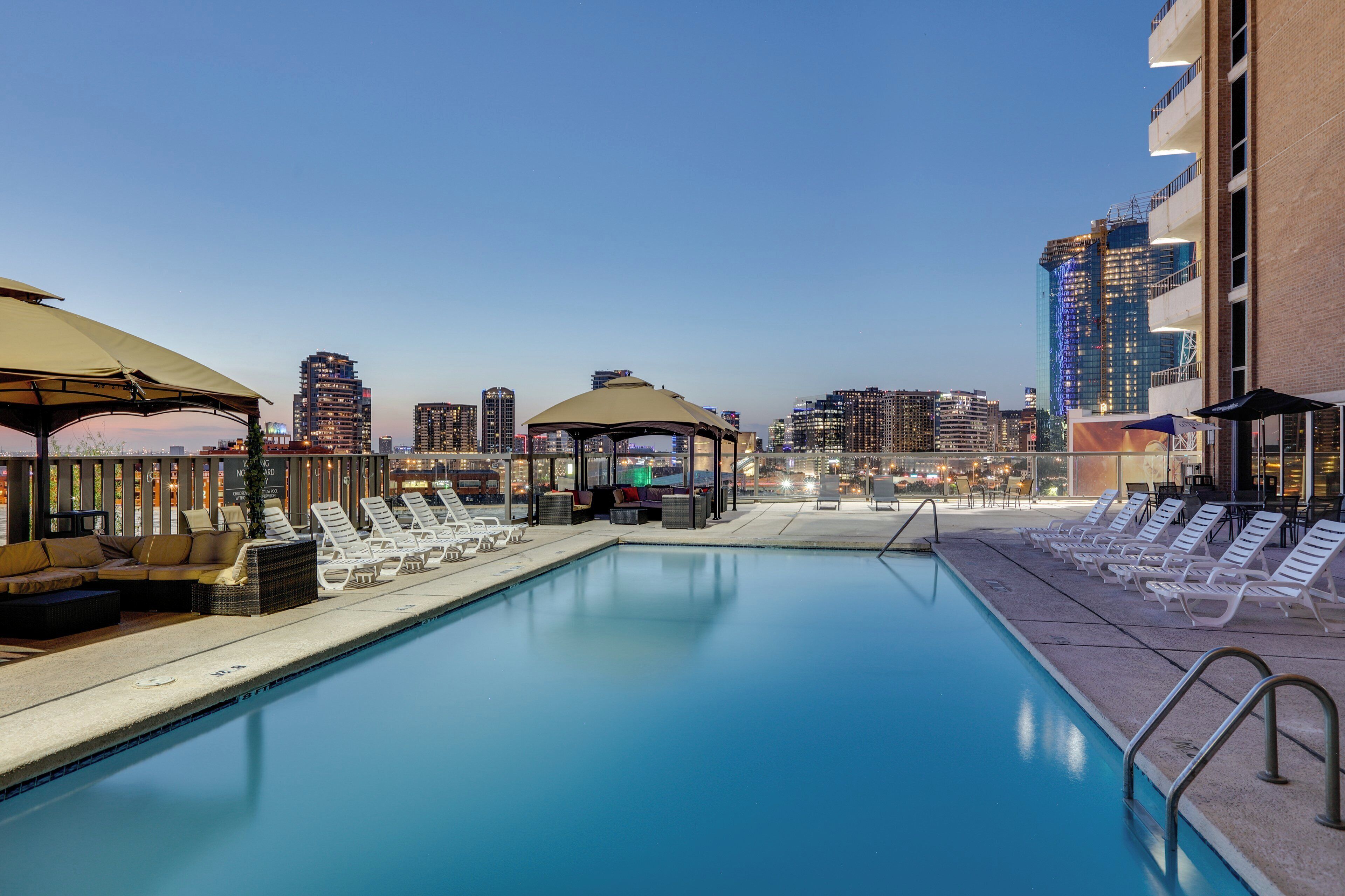 Outdoor pool, open 8:00 AM to 11:00 PM, free cabanas, pool umbrellas