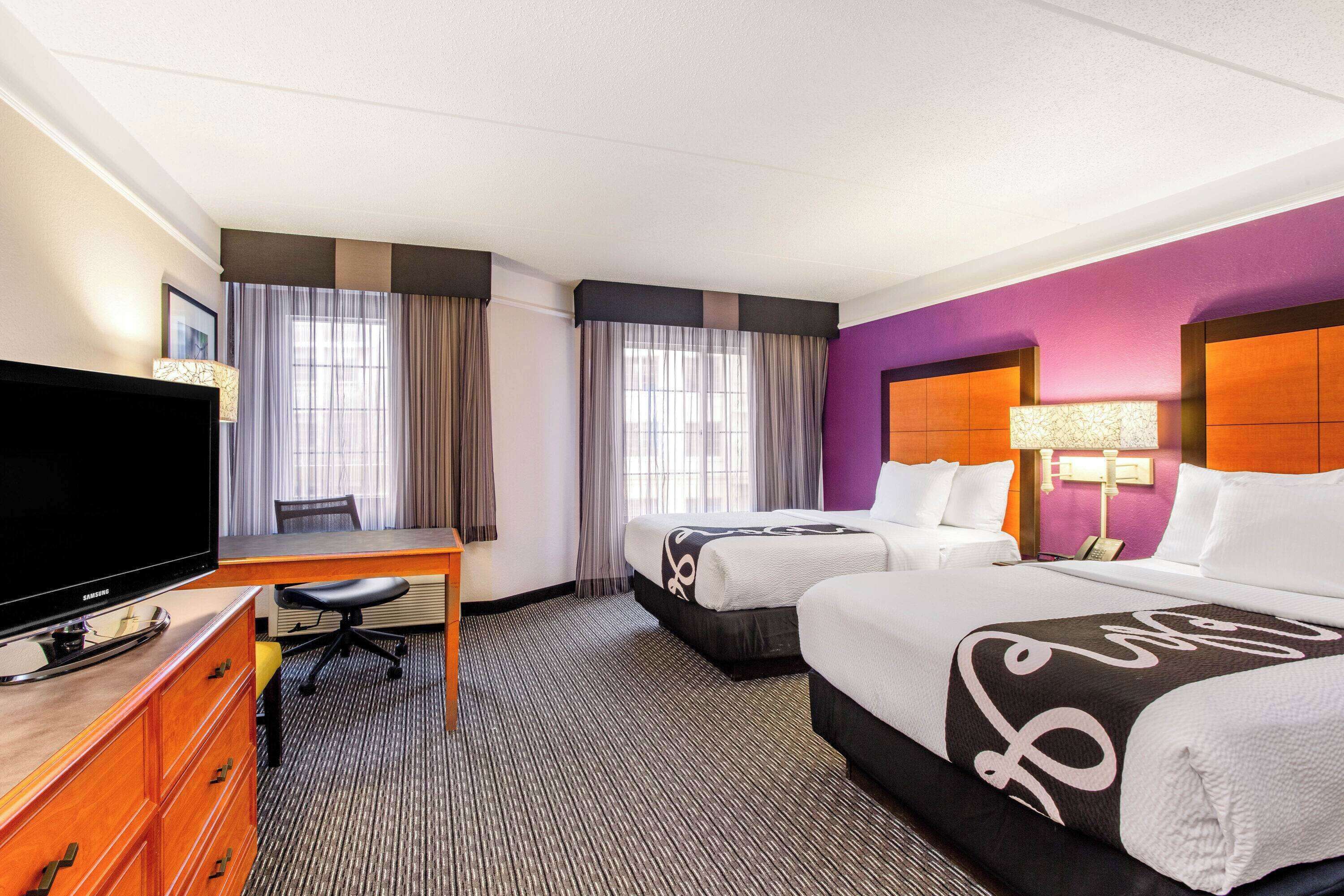 premium bedding, pillow-top beds, desk, iron/ironing board