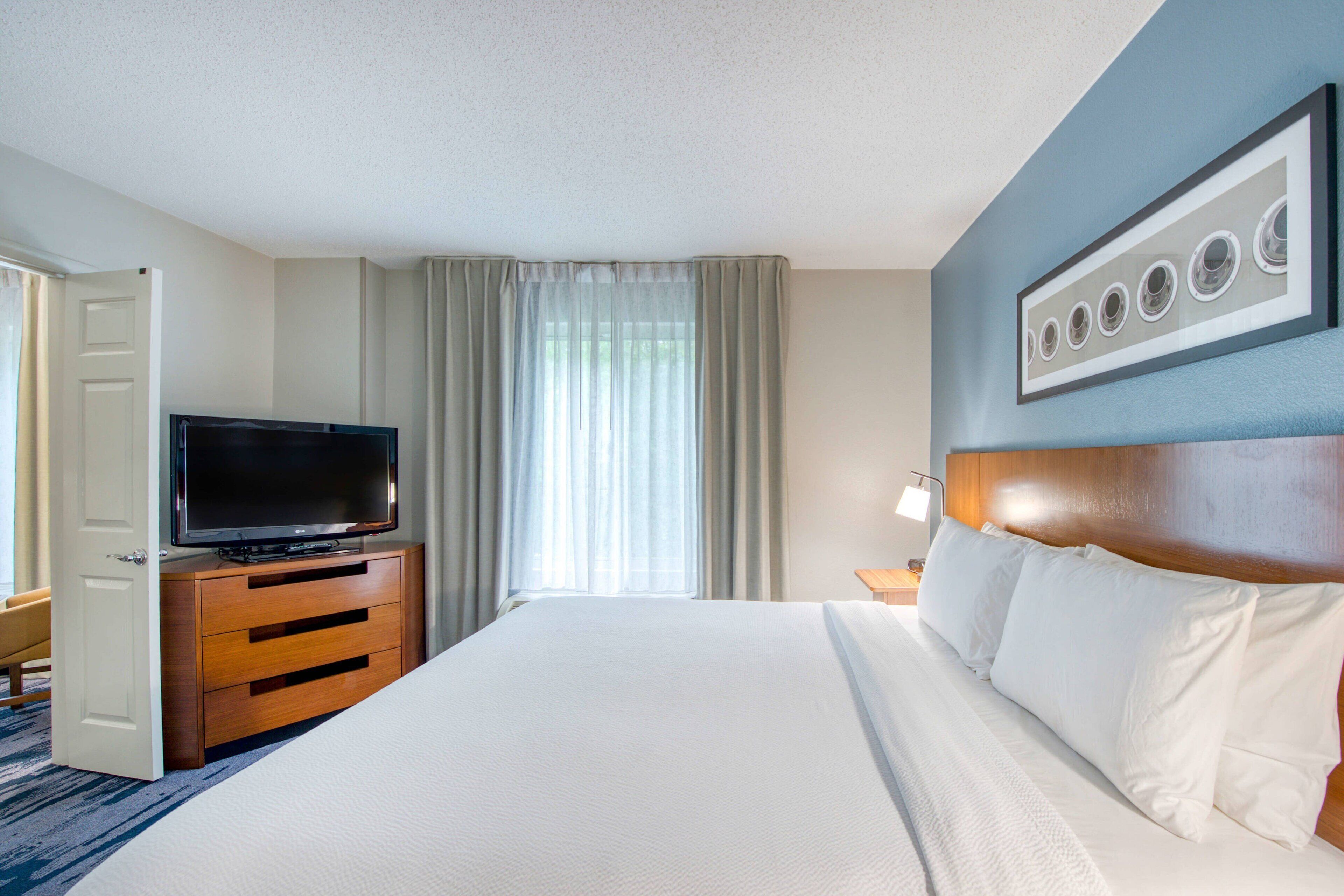 Premium bedding, down comforters, desk, blackout drapes