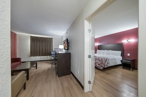 Suite, 1 King Bed, Non Smoking | Desk, iron/ironing board, free WiFi, bed sheets