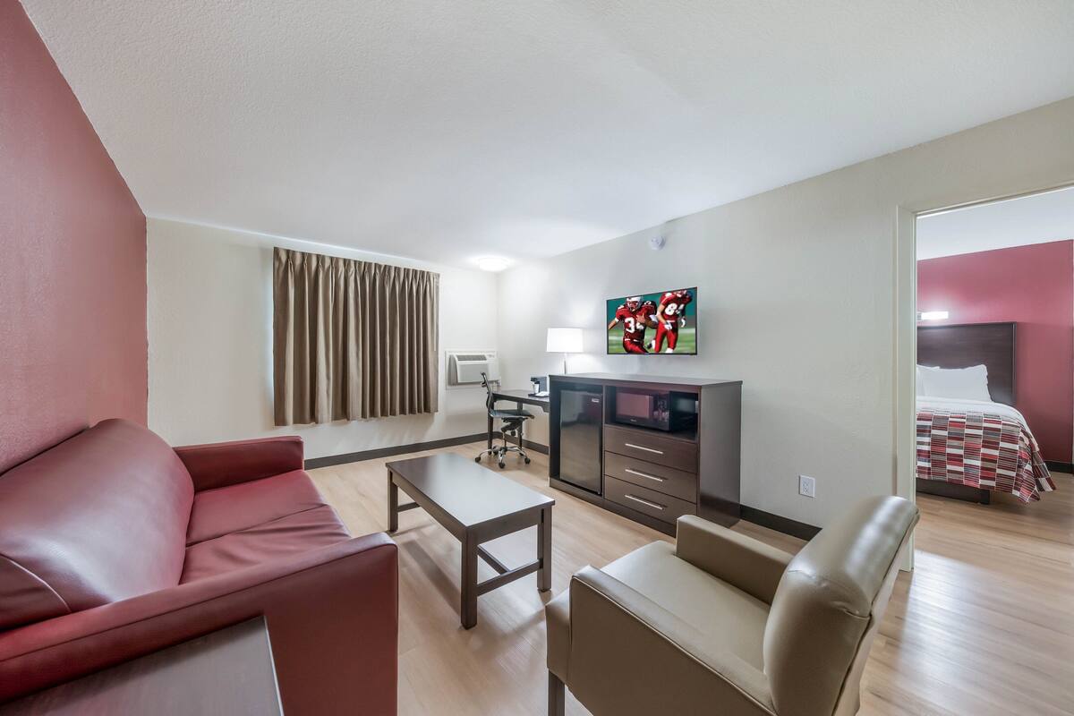 Suite, 2 Queen Beds, Non Smoking | Desk, iron/ironing board, WiFi (free), bed sheets