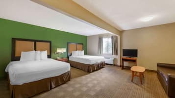 Camas con pillow-top, escritorio y espacio para trabajar con laptop