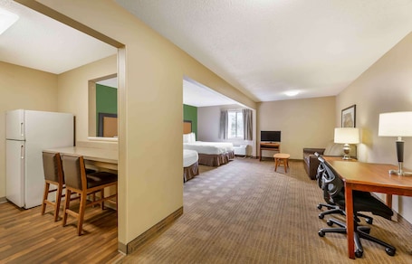 Pillowtop beds, desk, laptop workspace, blackout drapes. Suburban Studios Copley Akron West