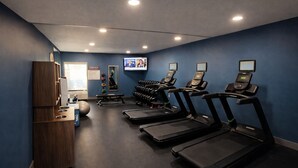 A gym with treadmills, weights, and exercise balls. - Best Western Cy-Fair (Houston)