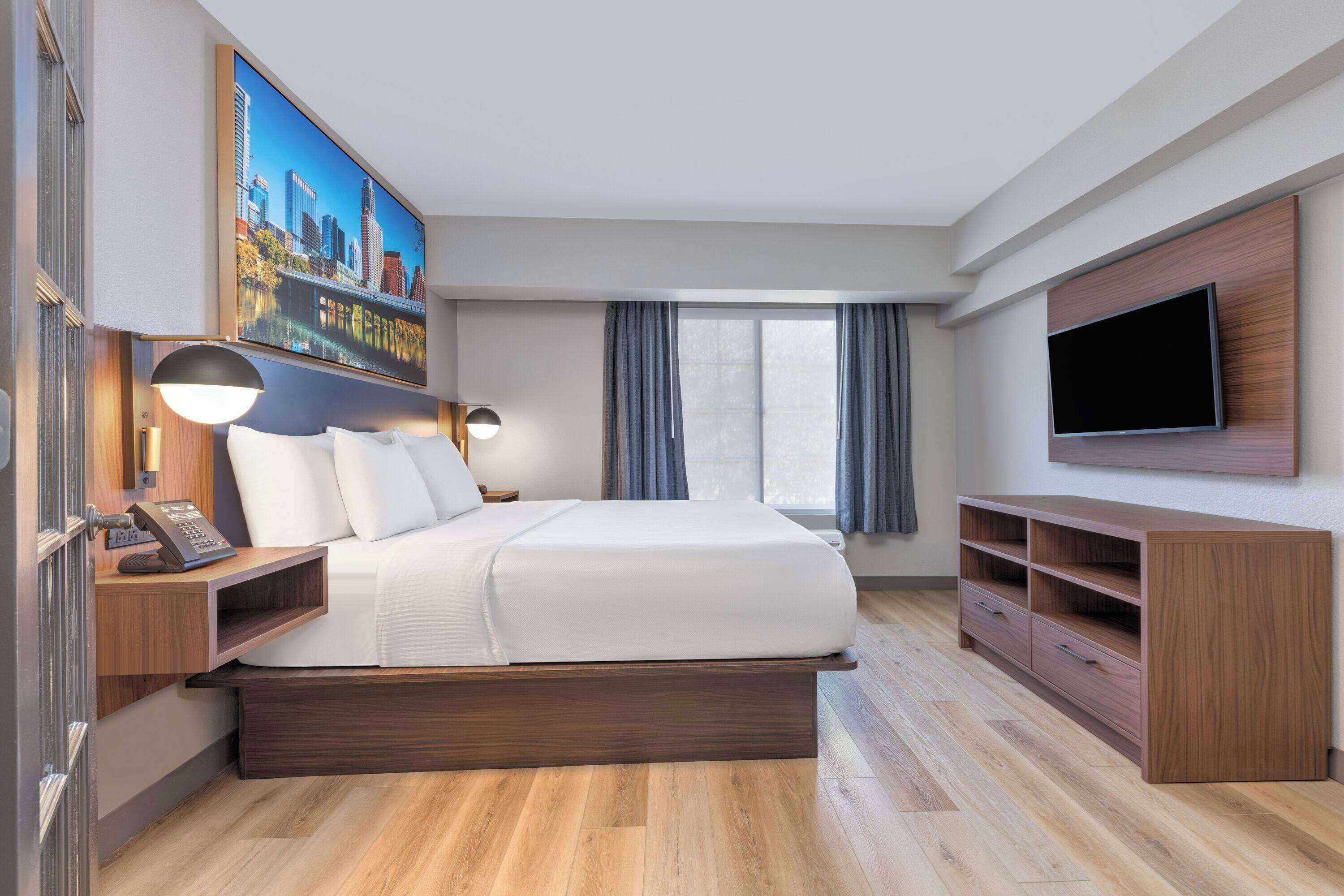 suite, 1 king bed, non smoking | premium bedding, desk, laptop workspace, iron/ironing board