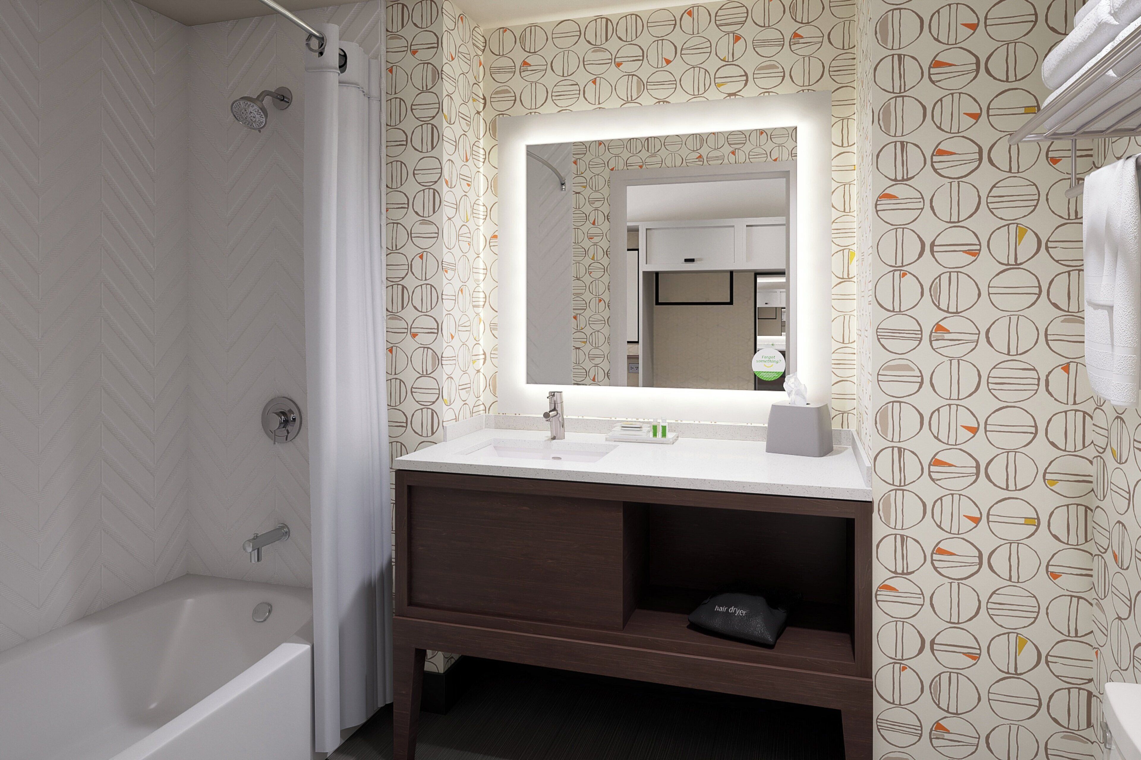 Ensemble douche/baignoire, articles de toilette gratuits, sèche-cheveux