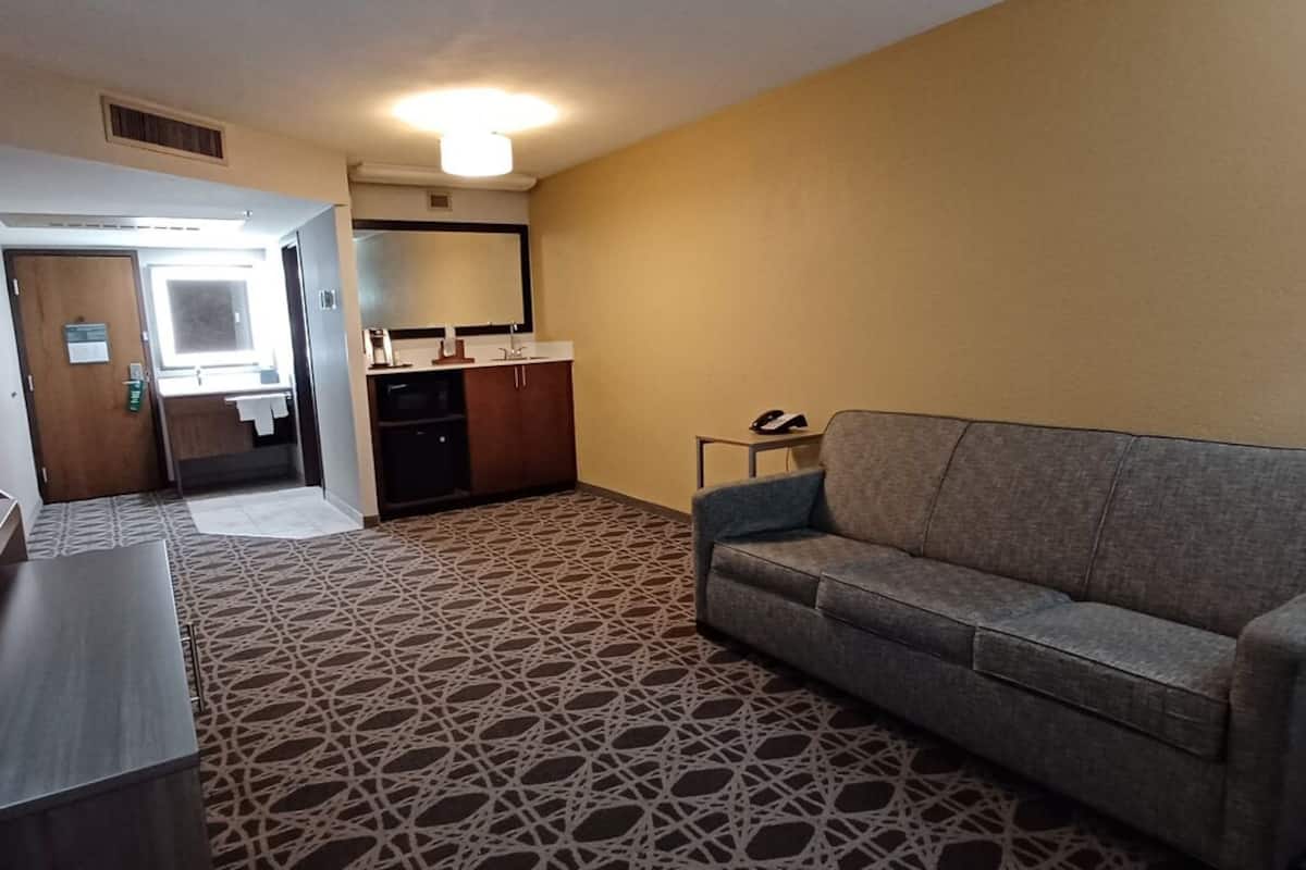 suite, 2 queen beds | living area | lcd tv