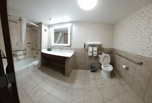 Suite, 1 King Bed, Accessible (Communications) | Bathroom | Combined shower/tub, free toiletries, hair dryer, towels