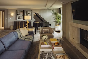 55-inch Smart TV with cable channels, DVD player, iPod dock