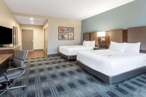 Hypo-allergenic bedding, pillow-top beds, desk, laptop workspace