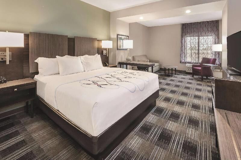 Hypo-allergenic bedding, pillow-top beds, desk, laptop workspace
