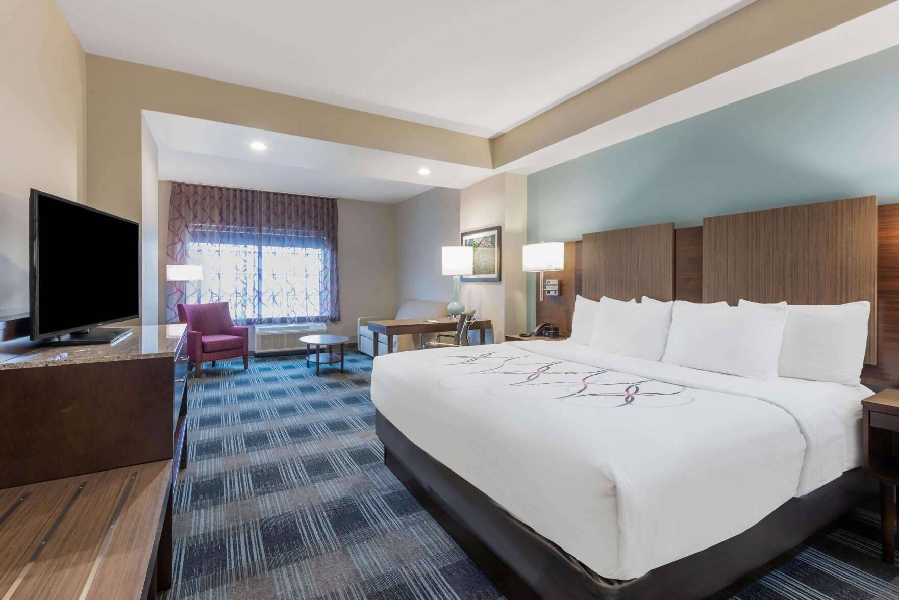 Hypo-allergenic bedding, pillow-top beds, desk, laptop workspace