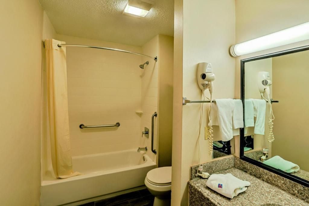 Eco-friendly toiletries, hair dryer, towels