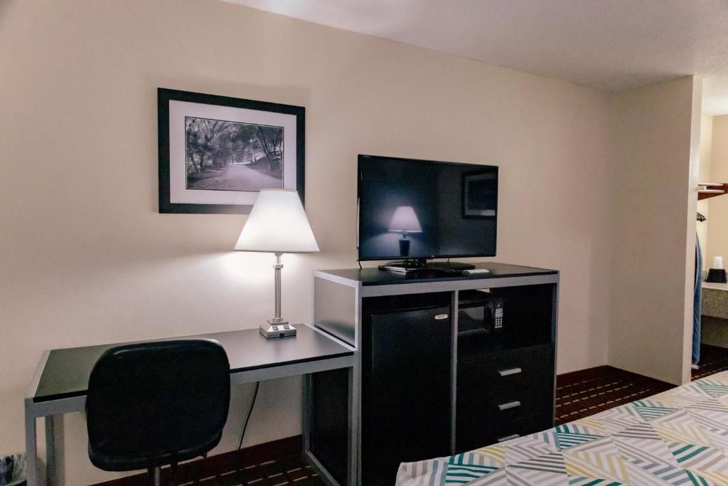 Desk, laptop workspace, blackout drapes, soundproofing