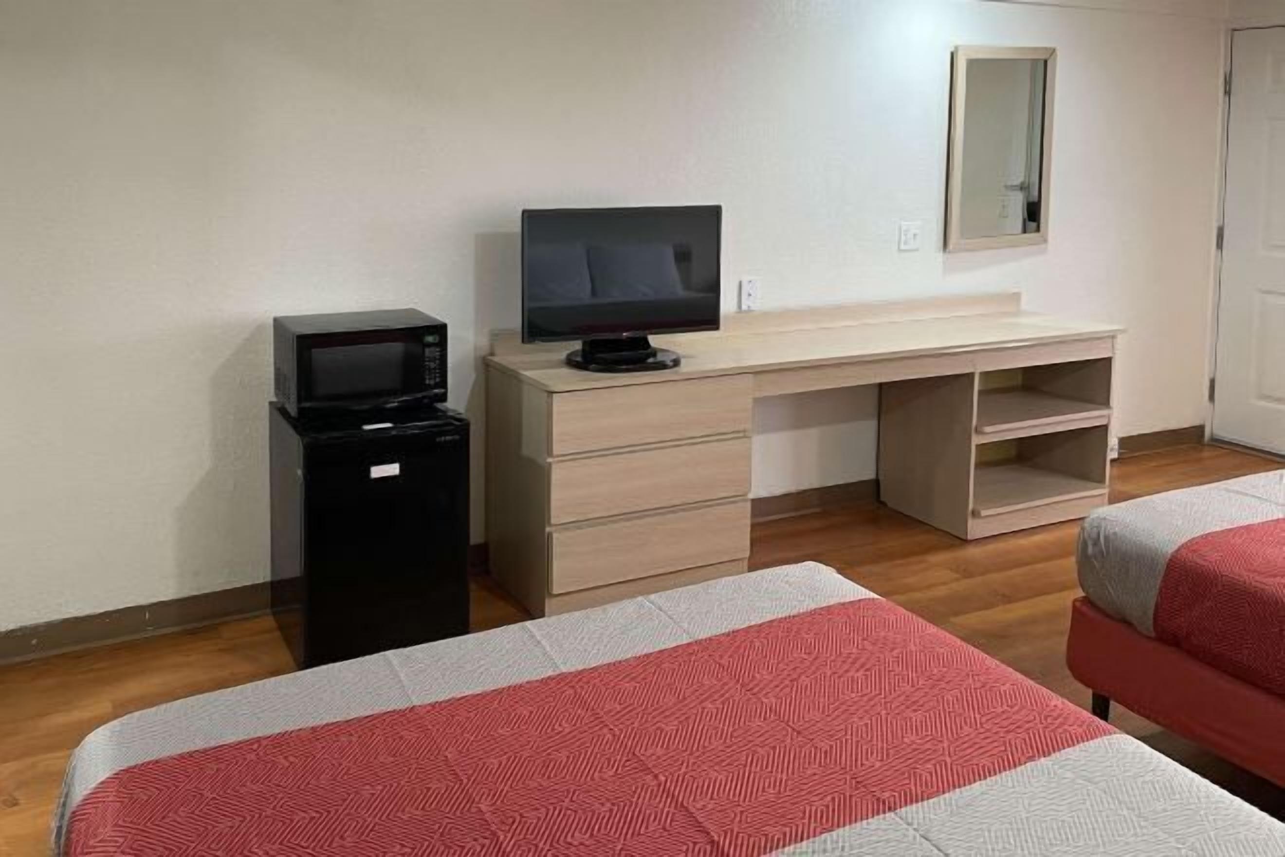 Desk, laptop workspace, blackout curtains, free WiFi