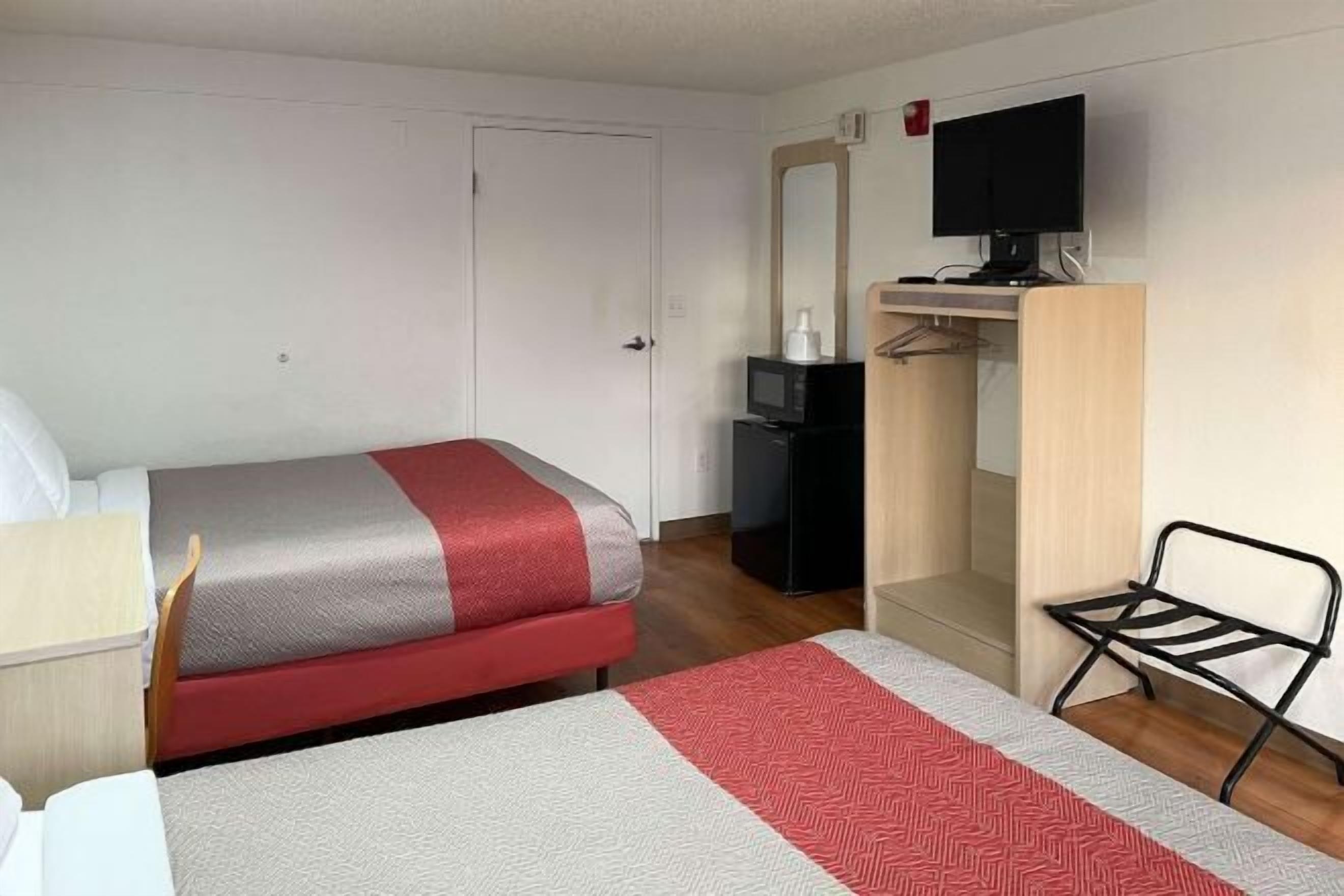 Desk, laptop workspace, blackout curtains, free WiFi