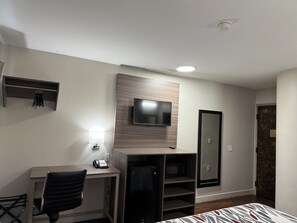 Desk, laptop workspace, blackout drapes, free cribs/infant beds