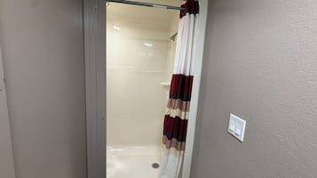 Combined shower/tub, free toiletries, towels, soap
