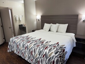 Desk, laptop workspace, blackout drapes, free cribs/infant beds