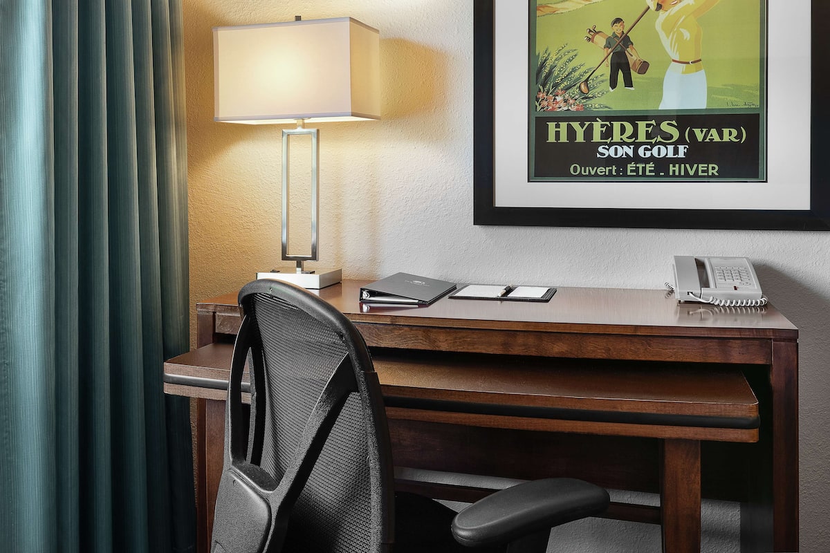 Hypo-allergenic bedding, in-room safe, blackout drapes