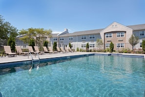 Indoor pool, seasonal outdoor pool, pool umbrellas, pool loungers