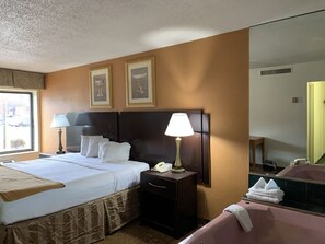 Standard Room, 1 King Bed, Jetted Tub | Desk, laptop workspace, iron/ironing board, cribs/infant beds