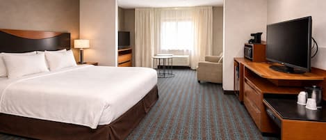 Desk, laptop workspace, blackout drapes, iron/ironing board