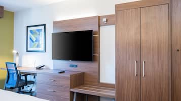 Desk, laptop workspace, blackout drapes, iron/ironing board