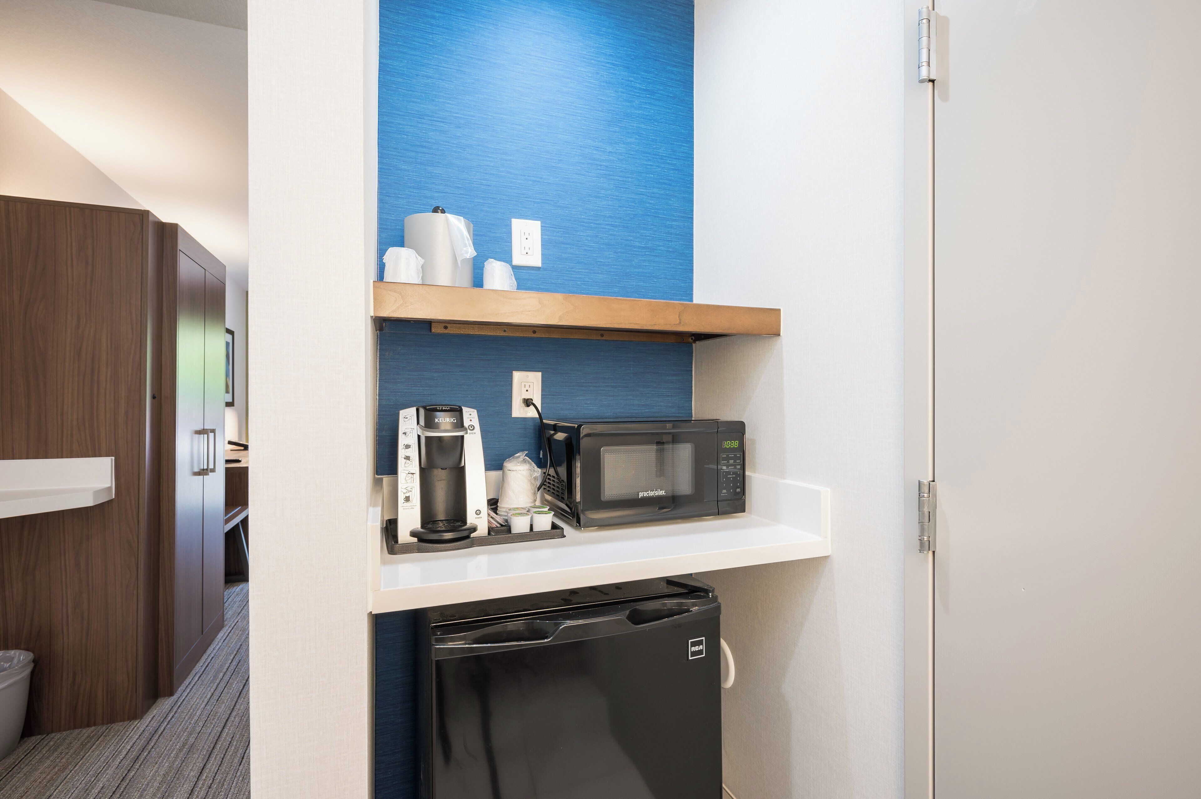 Desk, laptop workspace, blackout curtains, iron/ironing board