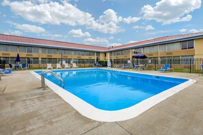 Seasonal outdoor pool, pool loungers