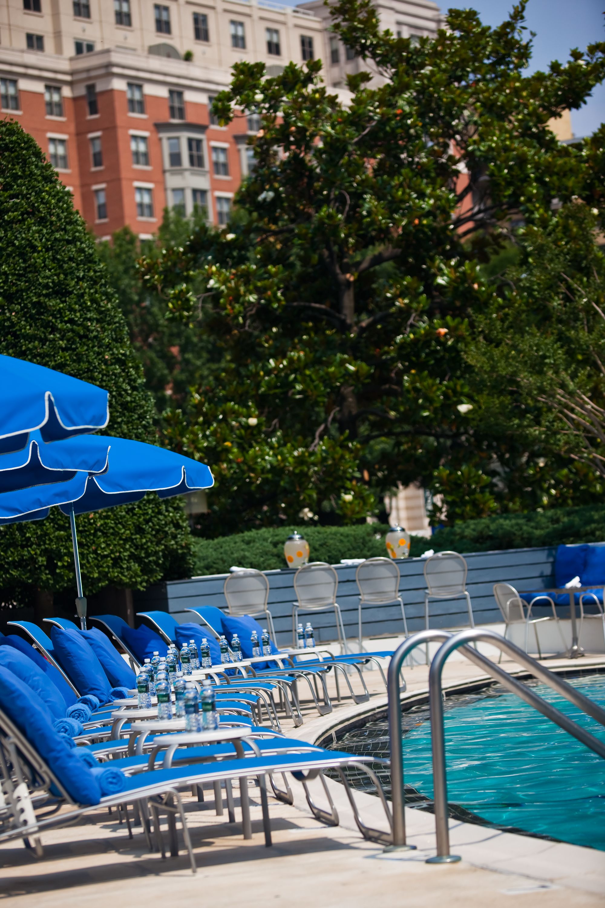 outdoor pool, open 9:00 am to 9:00 pm, pool umbrellas