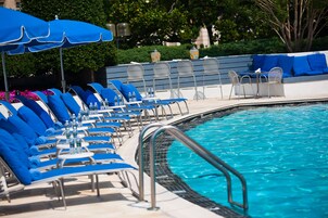 Outdoor pool, open 9:00 AM to 9:00 PM, pool umbrellas