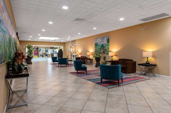 Hotel entrance and lobby at Ramada by Wyndham Kissimmee Gateway