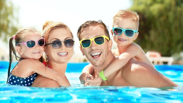 Seasonal outdoor pool, pool umbrellas, sun loungers