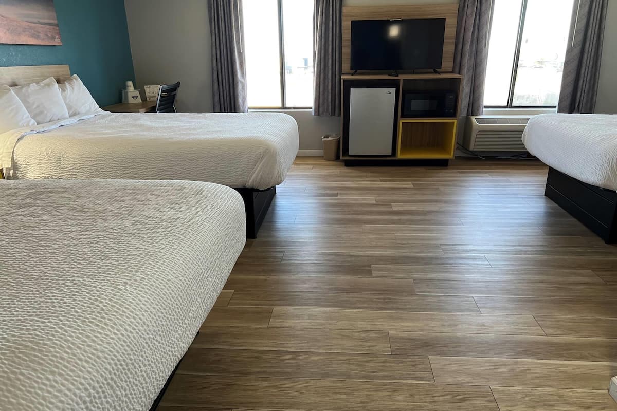 Basic Suite, Multiple Beds, Non Smoking | Desk, laptop workspace, free WiFi, alarm clocks