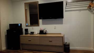 Desk, laptop workspace, blackout curtains, iron/ironing board