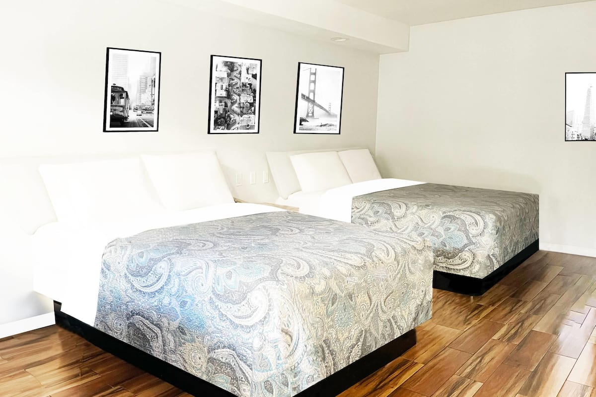 Standard Room, 2 Queen Beds, Non Smoking | Desk, laptop workspace, blackout curtains, iron/ironing board