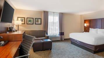 Room, 1 King Bed, Non Smoking (Larger Unit) | Premium bedding, desk, iron/ironing board, free WiFi