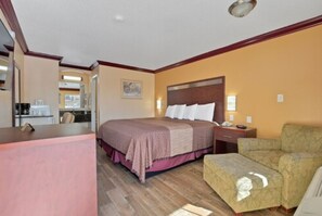 Standard Single Room, 1 King Bed, Non Smoking | In-room safe, desk, blackout drapes, iron/ironing board