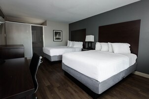 Premium Room, 2 Double Beds | Desk, blackout drapes, iron/ironing board, rollaway beds