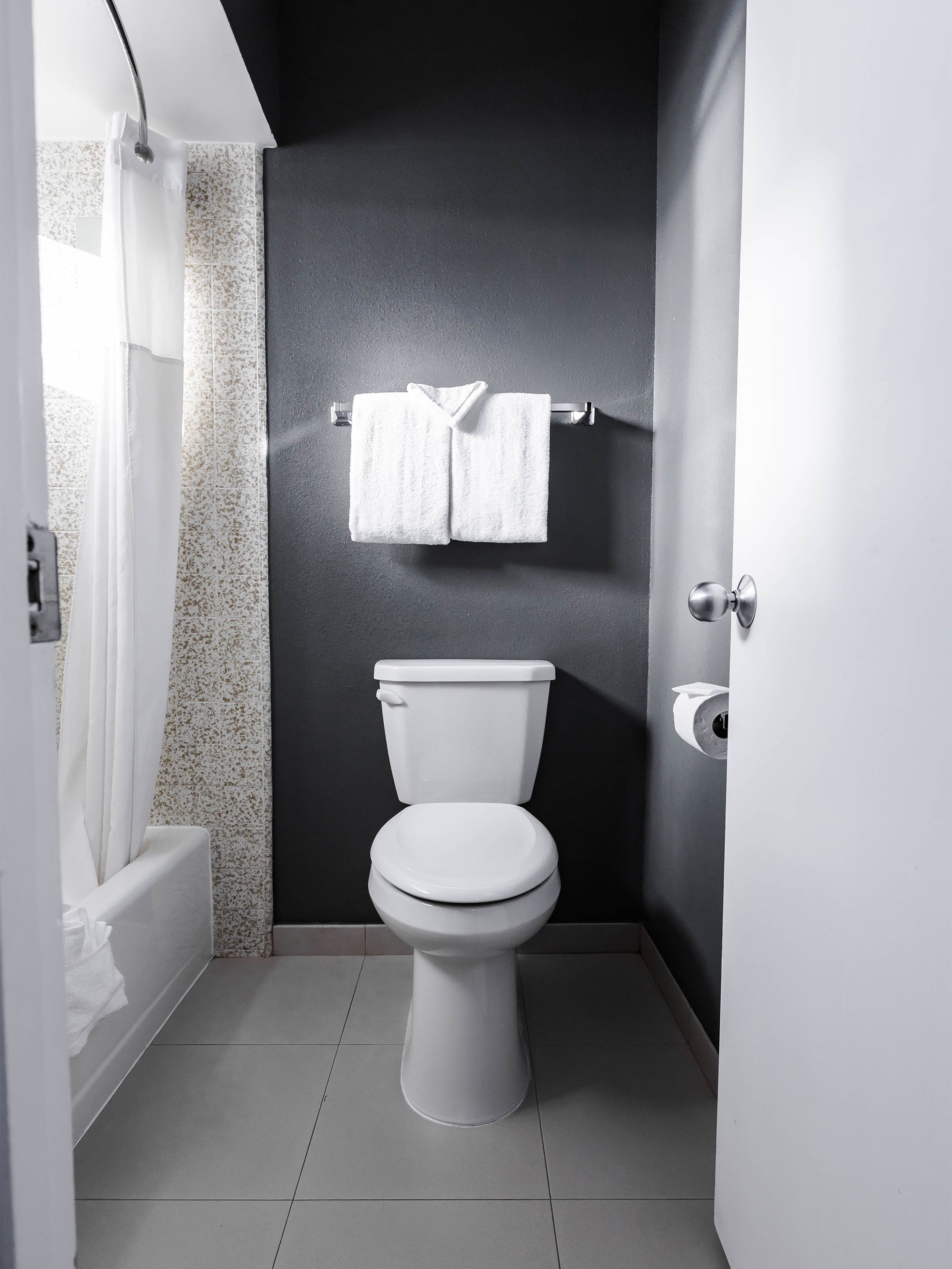 Premium Room, 2 Double Beds | Bathroom | Combined shower/tub, free toiletries, hair dryer, towels