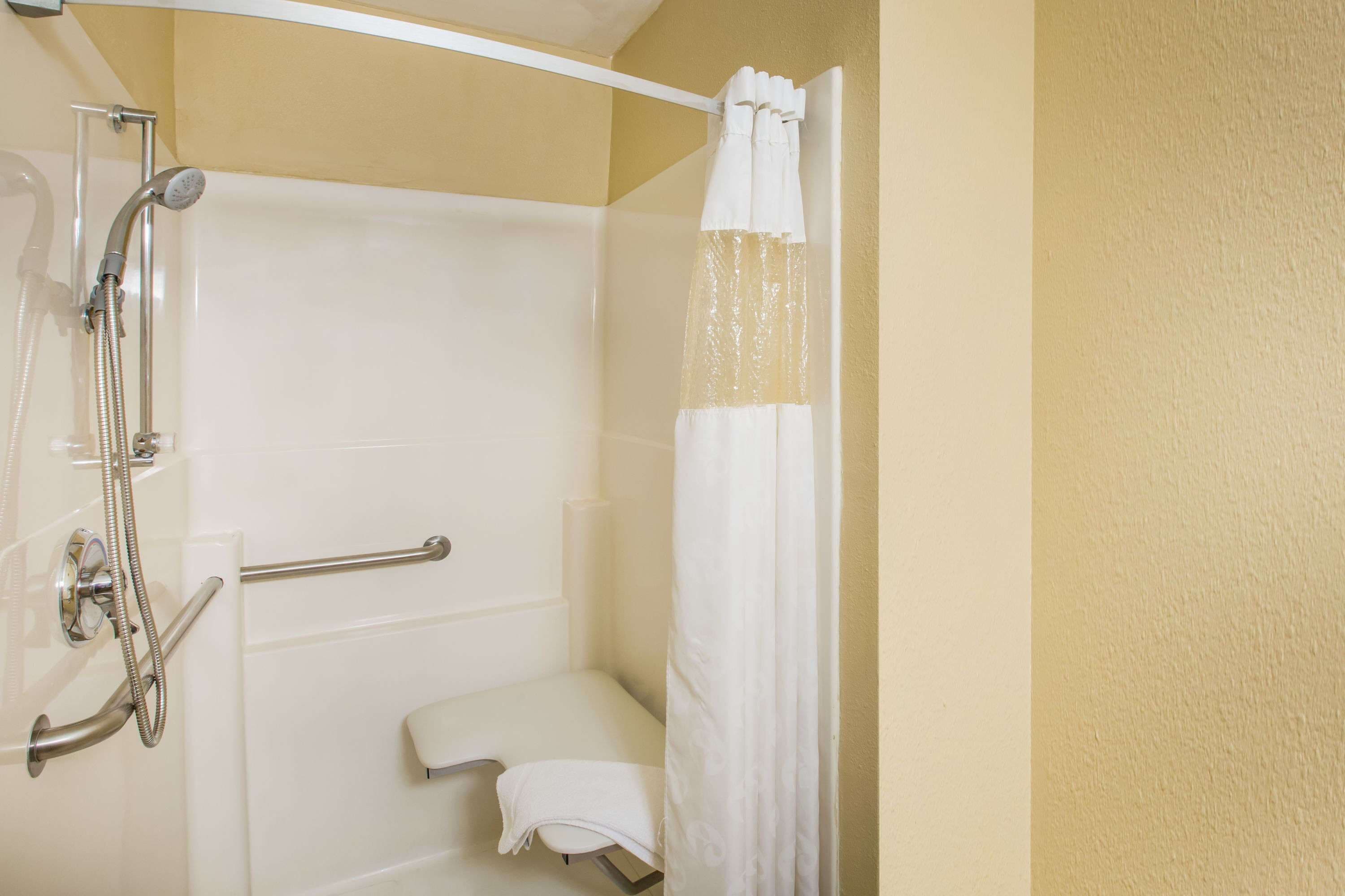 combined shower/bathtub, free toiletries, hair dryer, towels