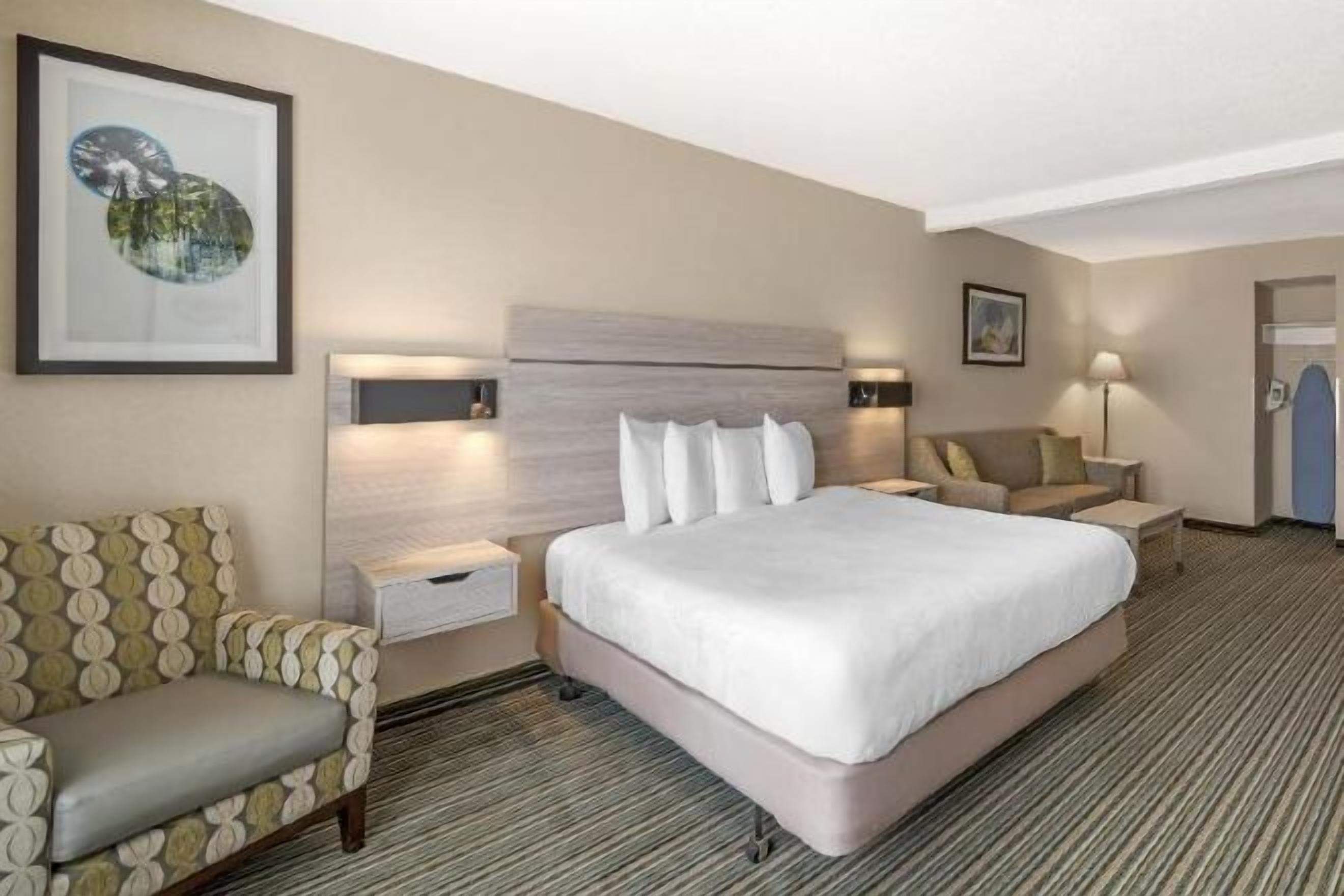 Laptop workspace, blackout drapes, iron/ironing board