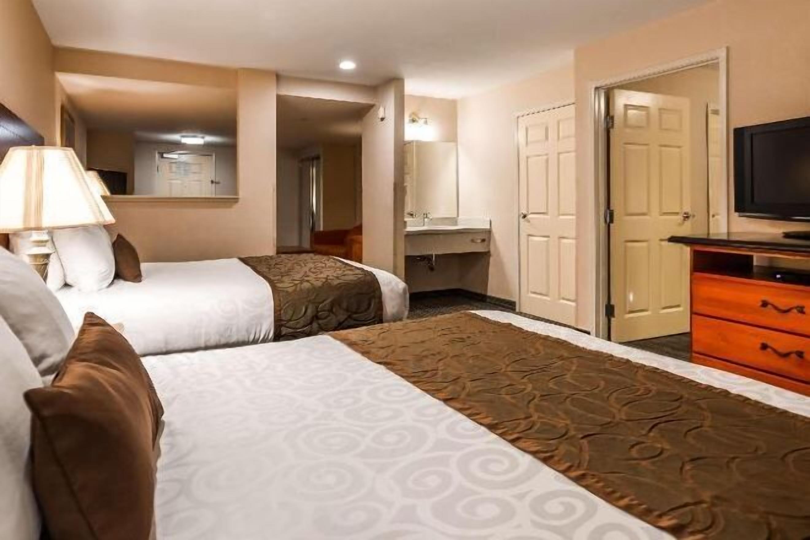 Laptop workspace, blackout drapes, iron/ironing board