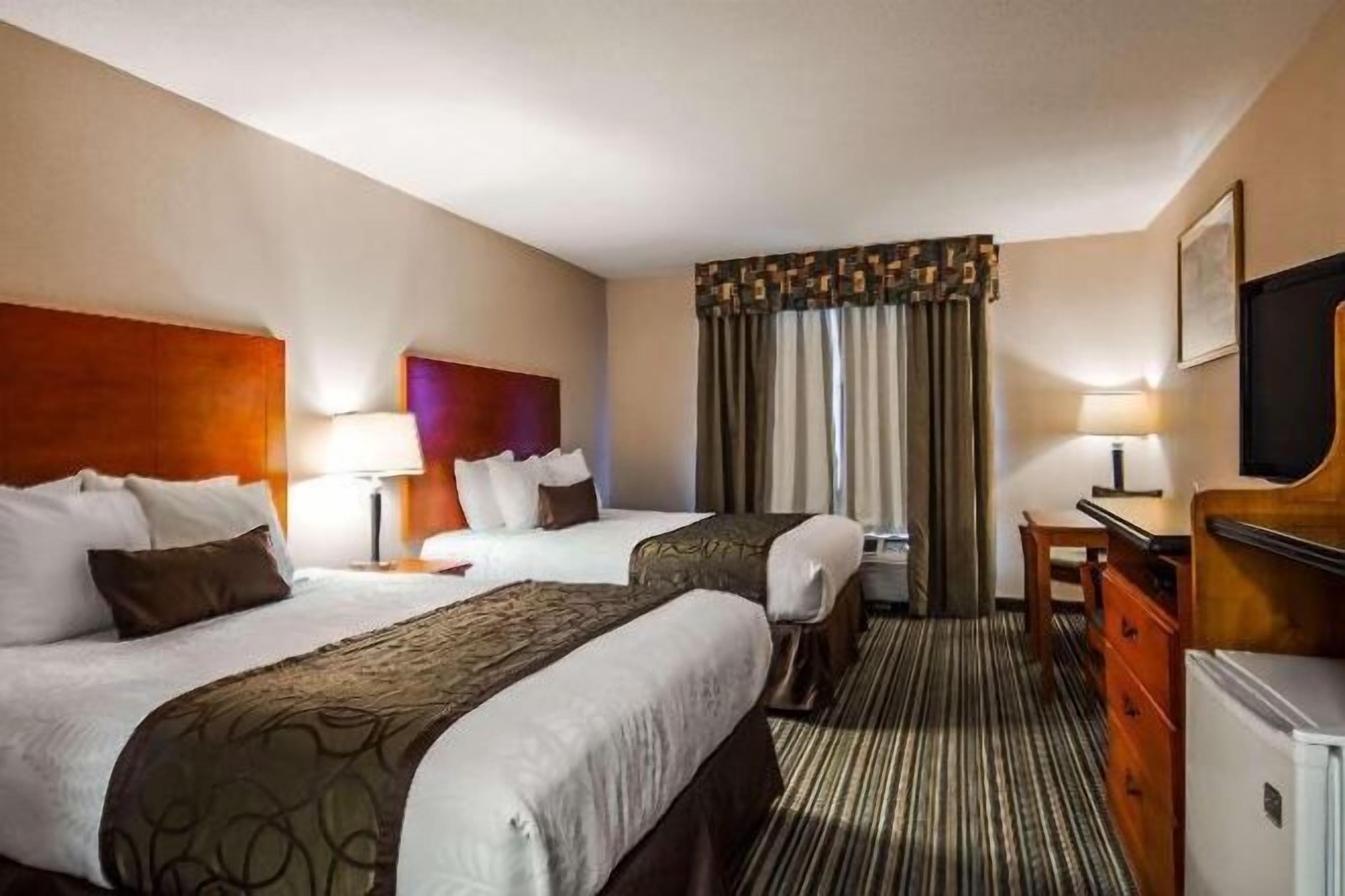 Laptop workspace, blackout drapes, iron/ironing board