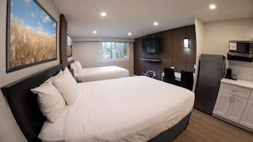 Deluxe Room, 2 Queen Beds, Non Smoking, City View | In-room safe, desk, laptop workspace, blackout curtains