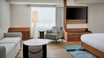 Studio, 1 Double Bed | Living area | 55-inch plasma TV with cable channels, TV, pay films